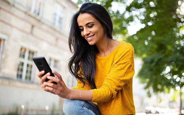 Woman looking at her mobile phone